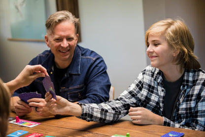 Family Playing Cat Ladies of Maple St - Sweet Bros Games